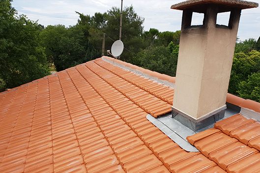 Toiture traditionnelle après travaux réparations Au Fil des Toits
